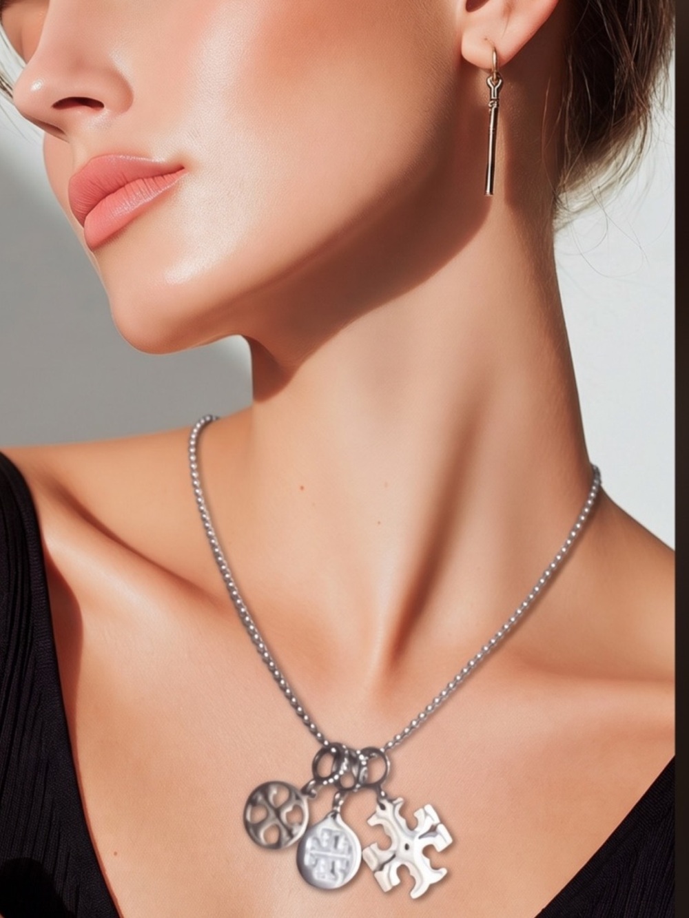 Three  Pendants  Tori Burch with Unbranded Chain.
